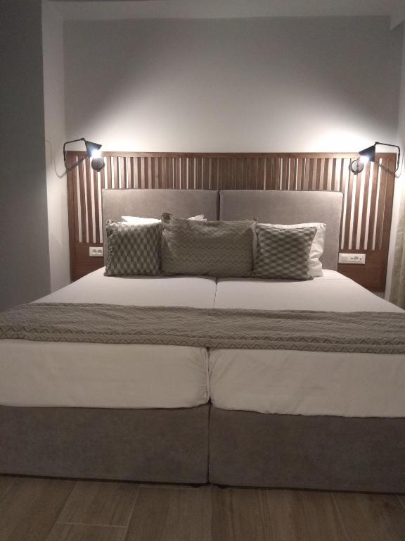 Voodi või voodid majutusasutuse Ariadni Rooms & Apartments toas