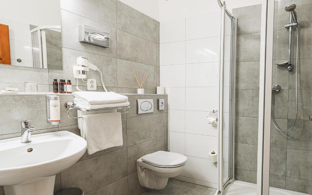 Koupelna v ubytování Hotel Horal