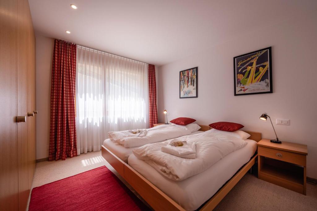 Postel nebo postele na pokoji v ubytování Chalet Am Acher 3
