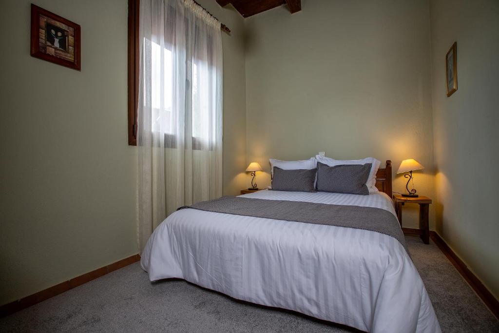 Łóżko lub łóżka w pokoju w obiekcie La Noi Guesthouse