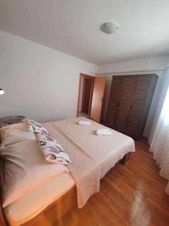 Postel nebo postele na pokoji v ubytování Apartment Kos
