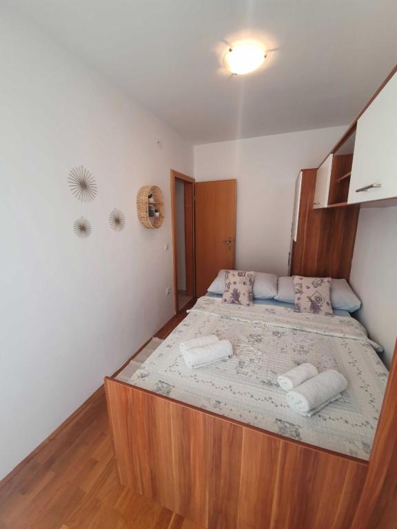 Postel nebo postele na pokoji v ubytování Apartment Kos