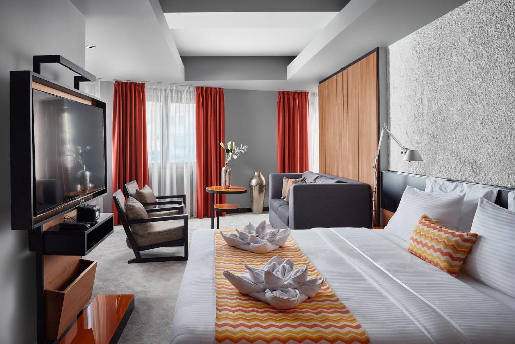 Postel nebo postele na pokoji v ubytování Hotel Panoramika Design & Spa