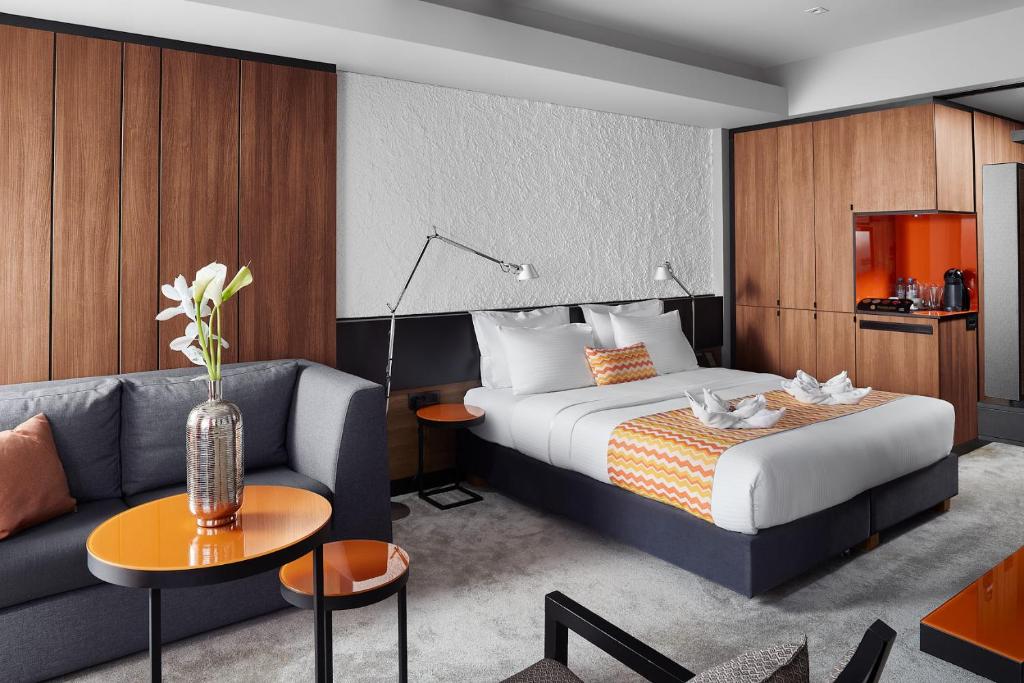 Postel nebo postele na pokoji v ubytování Hotel Panoramika Design & Spa