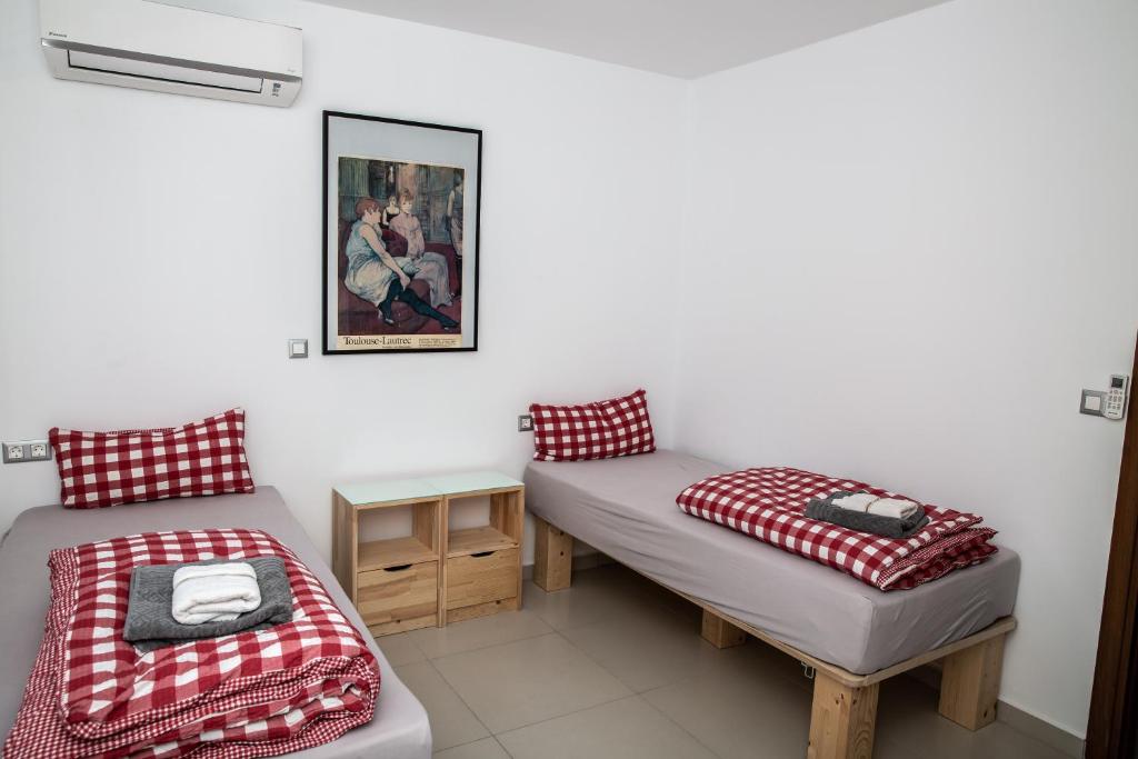 Łóżko lub łóżka w pokoju w obiekcie 5 Sterne Zeus City Apartment mit Meerblick