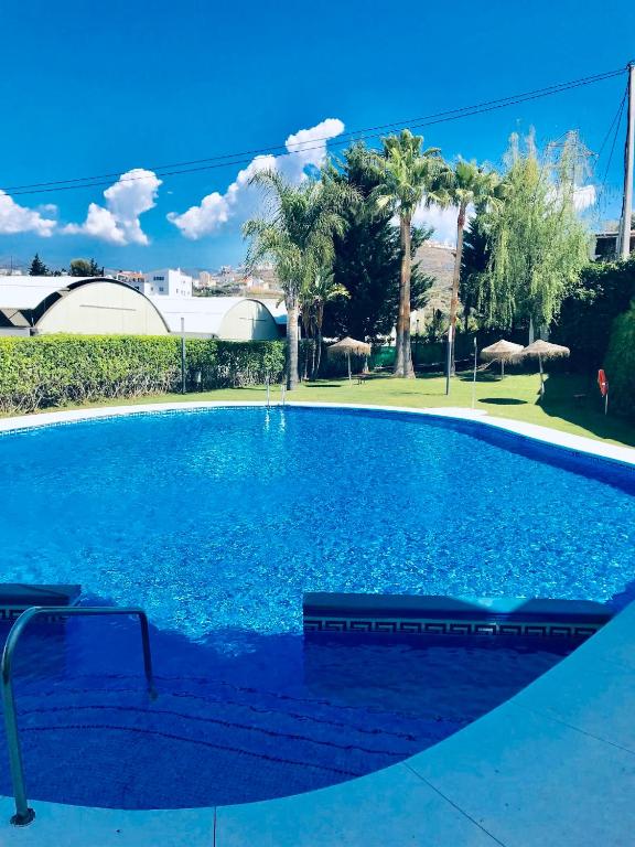 Bazén v ubytovaní Apartamento El Barco 1 linea PLAYA, PARKING, WIFI alebo v jeho blízkosti