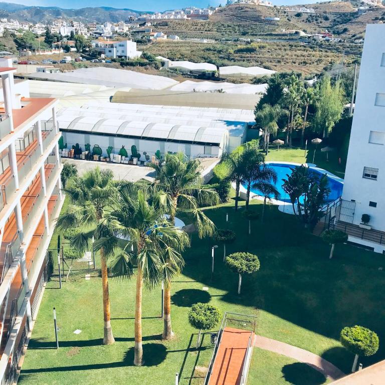 Bazén v ubytovaní Apartamento El Barco 1 linea PLAYA, PARKING, WIFI alebo v jeho blízkosti