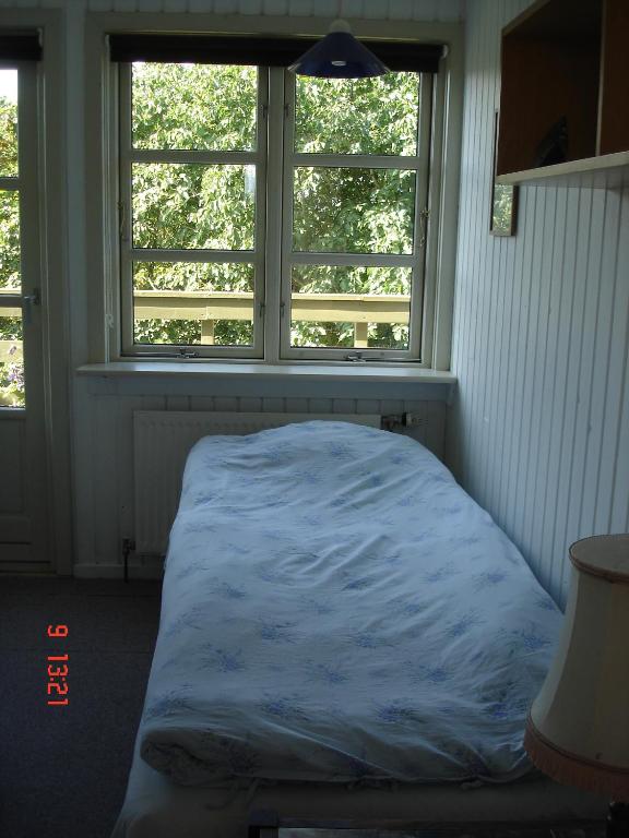 Postel nebo postele na pokoji v ubytování Munkebo B&B, Thy