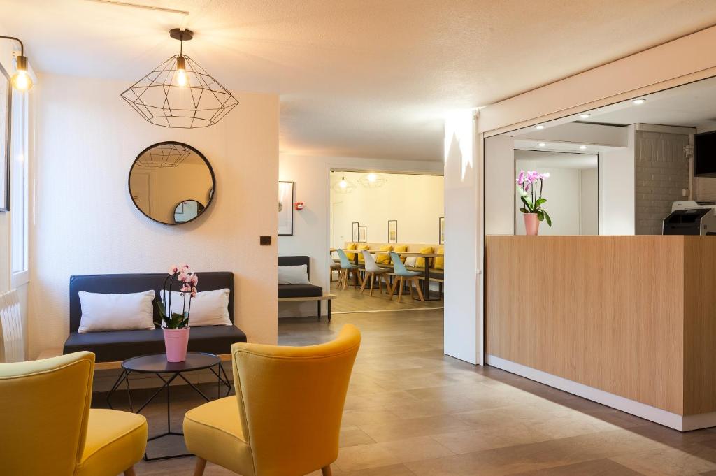 Posezení v ubytování Comfort Hotel Amiens Nord