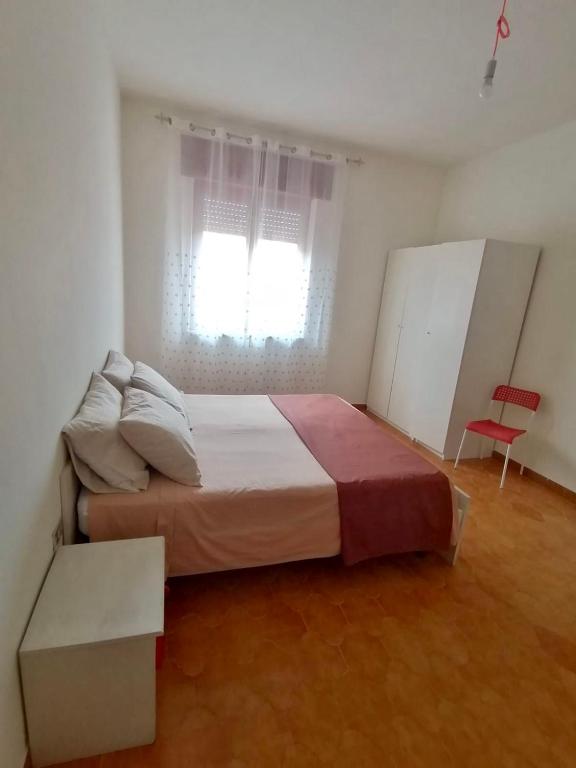 Posteľ alebo postele v izbe v ubytovaní White beach Le Castella