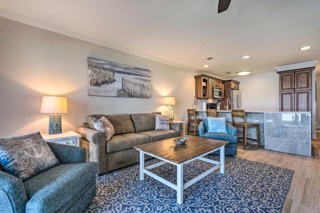 a living room with two couches and a table at Stewart House in the Beautiful SeaScape Resort in Destin