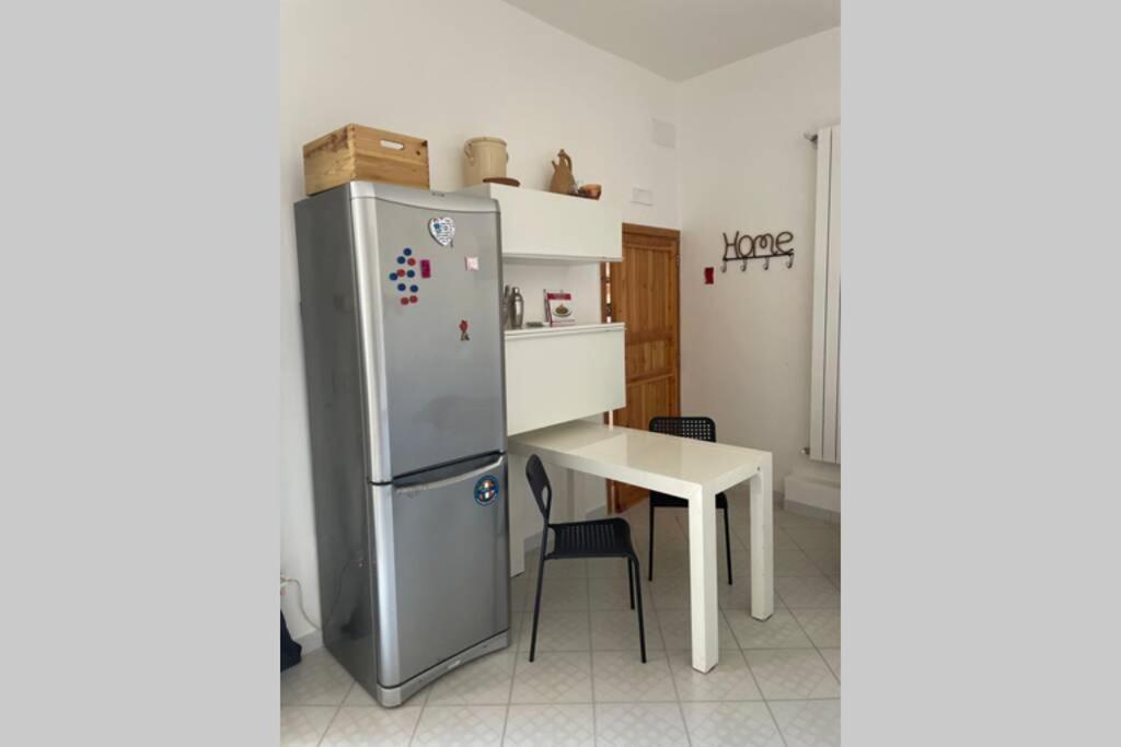 Kuchnia lub aneks kuchenny w obiekcie Suite San Benedetto, Terrazza vista mare