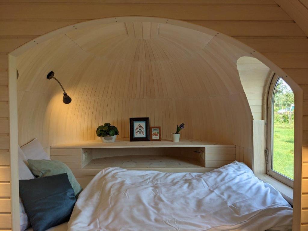 Postel nebo postele na pokoji v ubytování Camping Houtum