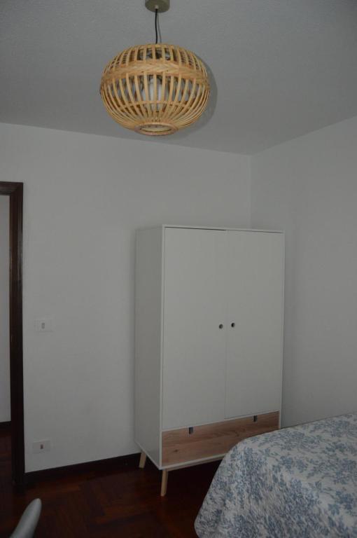 Postel nebo postele na pokoji v ubytování Fantástica vista de la Ría de Vigo en pleno centro