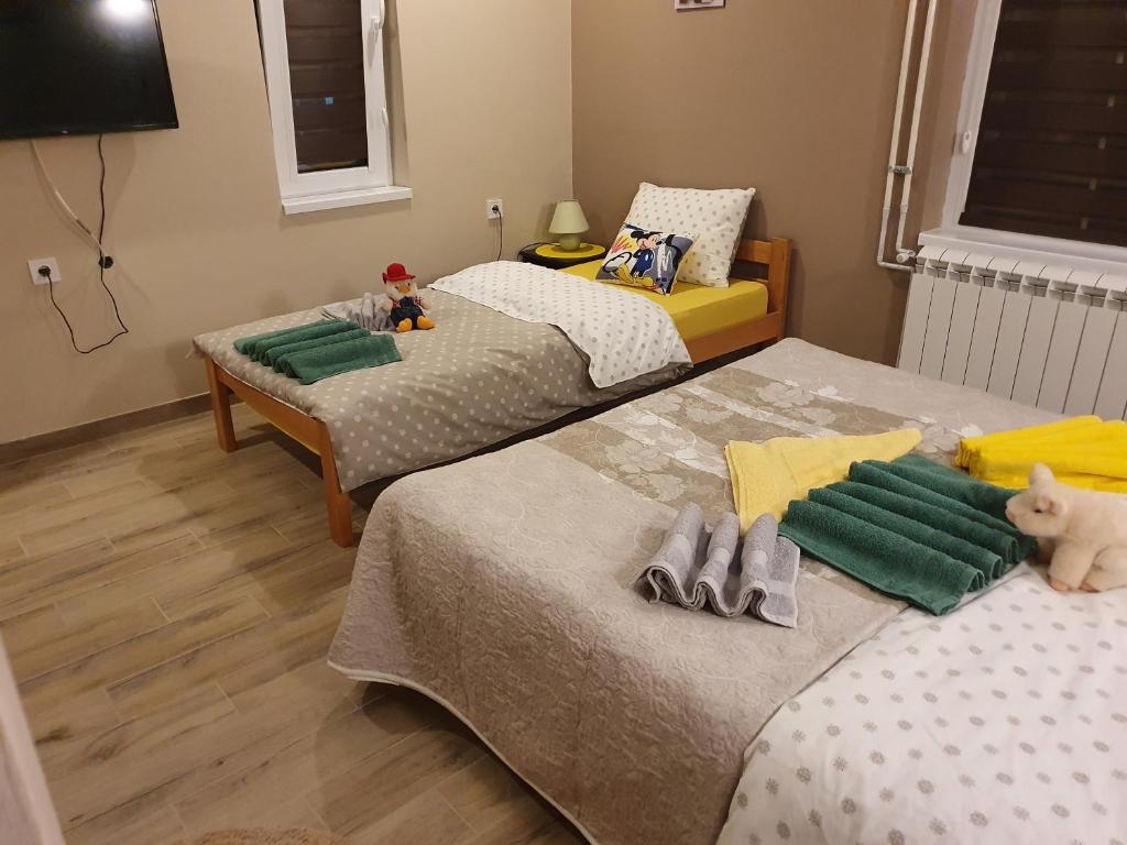 Postel nebo postele na pokoji v ubytování Guest House Jasmin