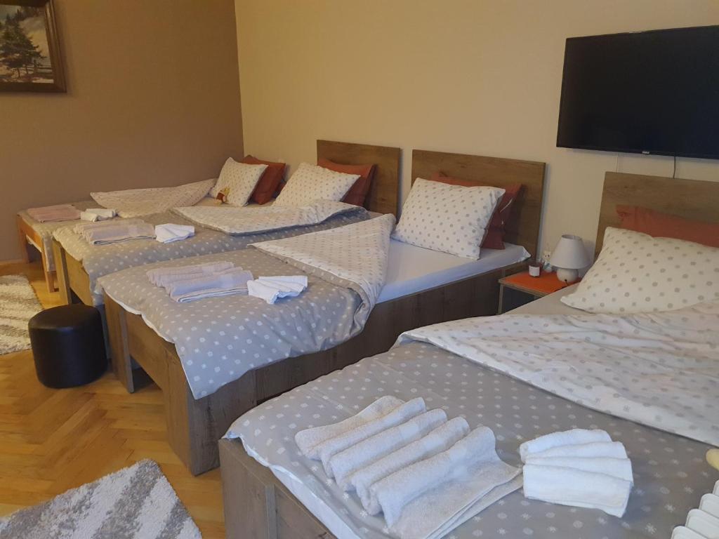Postel nebo postele na pokoji v ubytování Guest House Jasmin