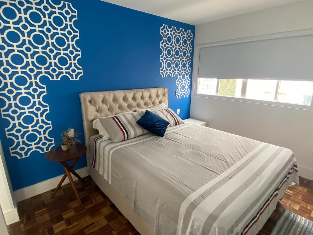 Uma cama ou camas num quarto em Prédio frente mar 3 quartos Balneário camboriú BrisaMarBC3
