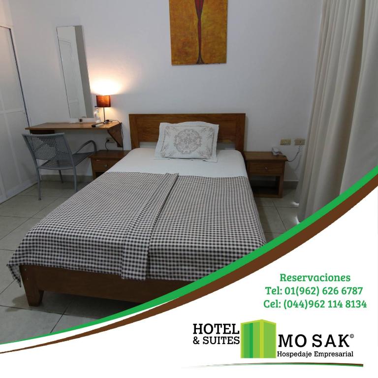 Postel nebo postele na pokoji v ubytování Hotel & Suites Mo Sak