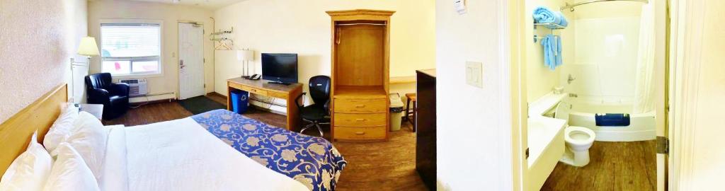 TV a/nebo společenská místnost v ubytování Grande Mountain Lodge