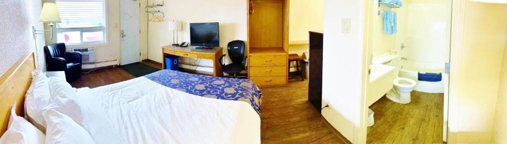 TV a/nebo společenská místnost v ubytování Grande Mountain Lodge