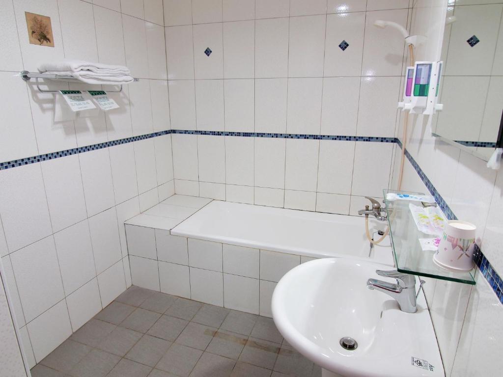 Koupelna v ubytování Yi Pin Yuan Hotel