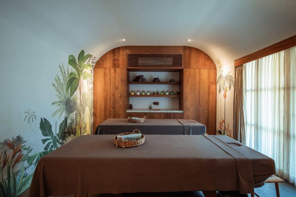 Postel nebo postele na pokoji v ubytování The Asa Maia - Bespoke Wellness Resort