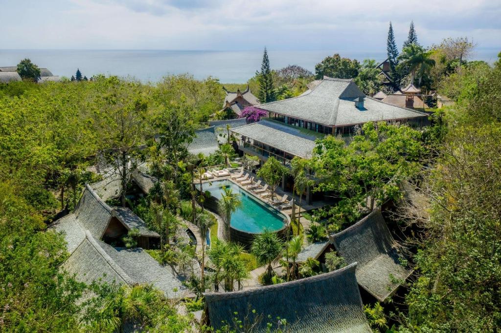 an aerial view of a resort with a swimming pool at The Asa Maia - Adults Only Resort in Uluwatu