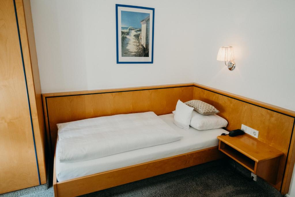 Postel nebo postele na pokoji v ubytování Hotel Crystal