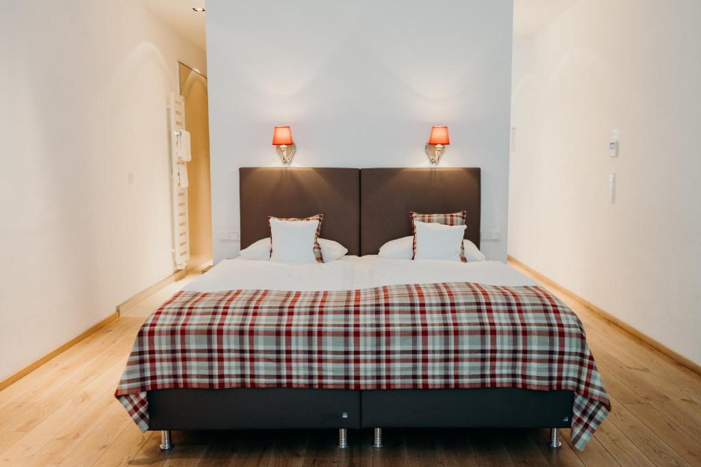 Postel nebo postele na pokoji v ubytování Hotel Crystal