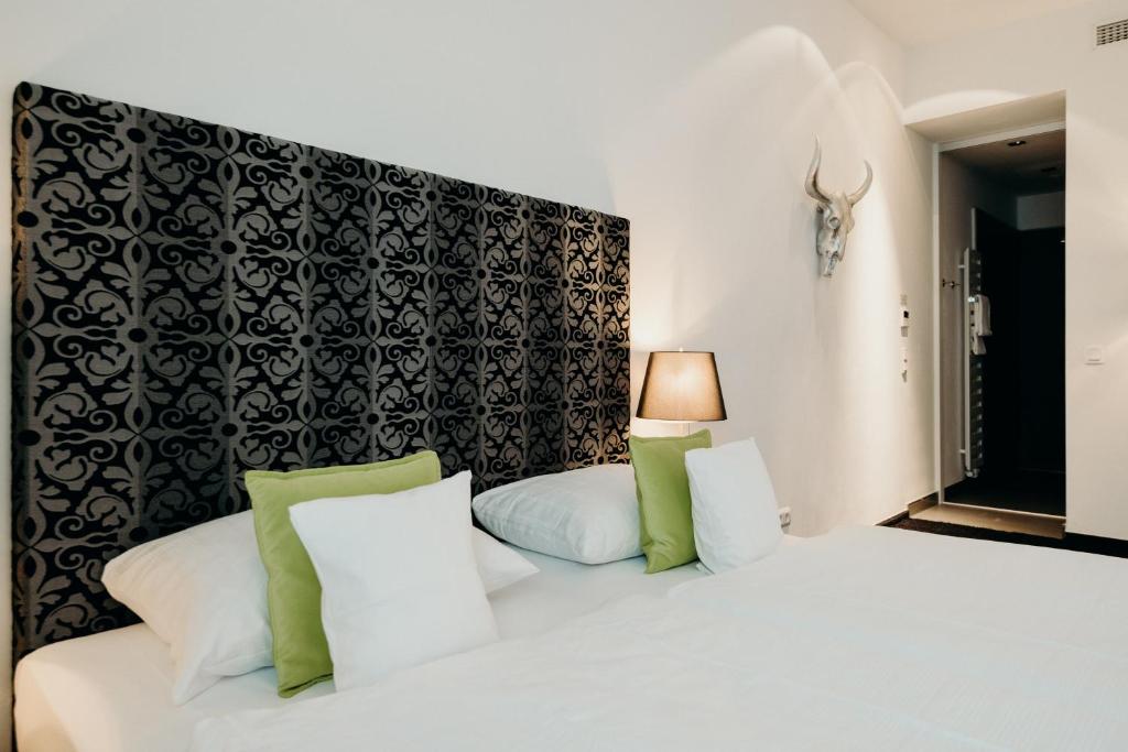 Postel nebo postele na pokoji v ubytování Hotel Crystal