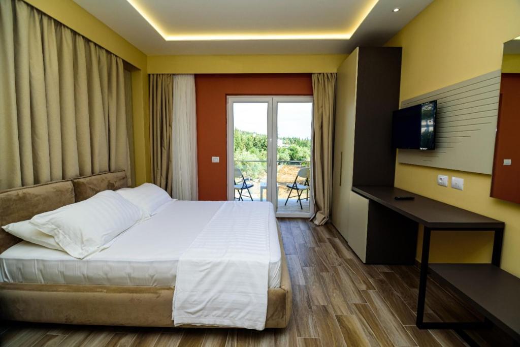 Postel nebo postele na pokoji v ubytování Hotel Orange