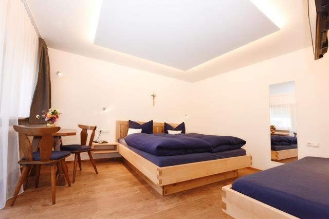 Postel nebo postele na pokoji v ubytování Haus Saler