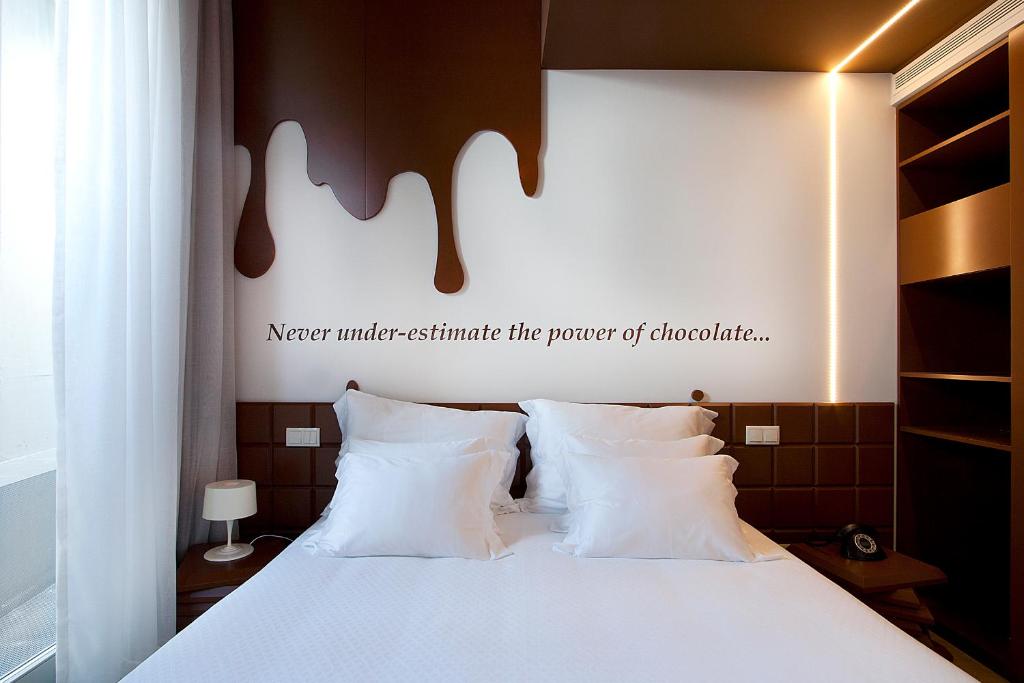 Postel nebo postele na pokoji v ubytování Hotel Fabrica do Chocolate