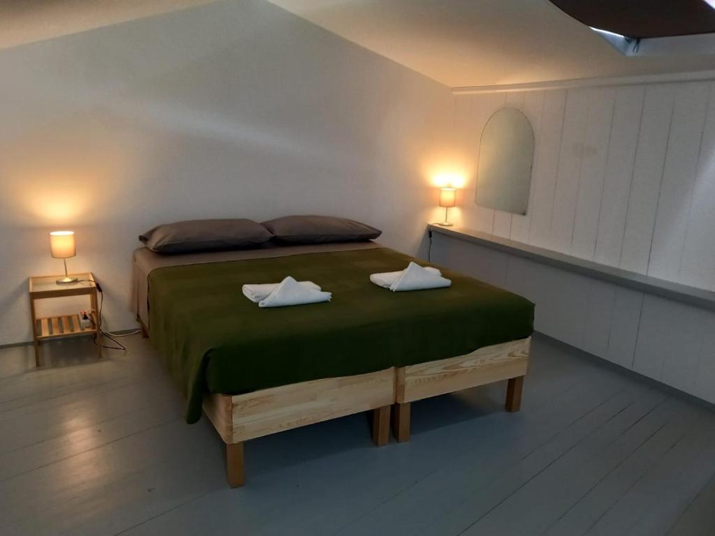 Postel nebo postele na pokoji v ubytování B&B La Forcella