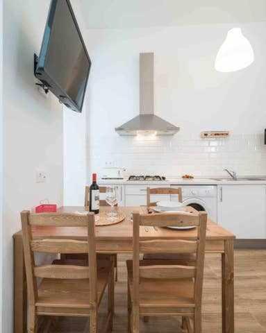 A kitchen or kitchenette at Apartamentos Alcazaba