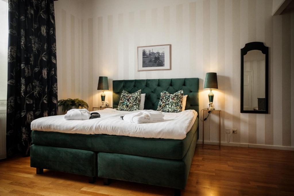 Postel nebo postele na pokoji v ubytování Badhotellet Spa & Konferens