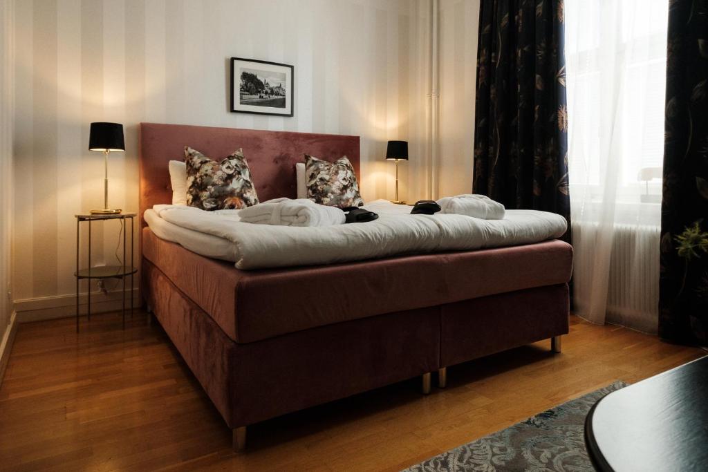 Postel nebo postele na pokoji v ubytování Badhotellet Spa & Konferens