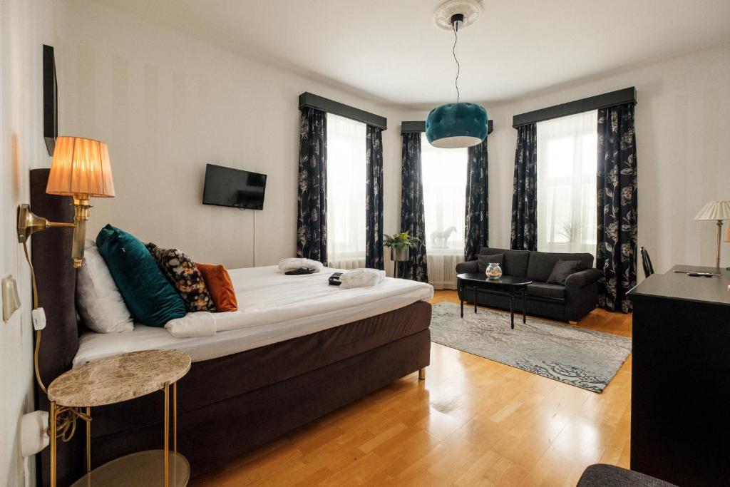 Postel nebo postele na pokoji v ubytování Badhotellet Spa & Konferens