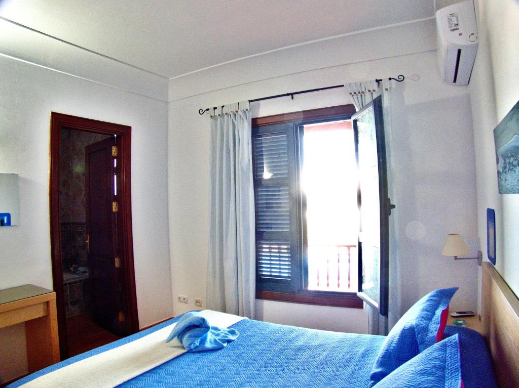 Postel nebo postele na pokoji v ubytování Villa Raima
