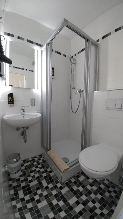 Koupelna v ubytování Hotel Xantener Eck