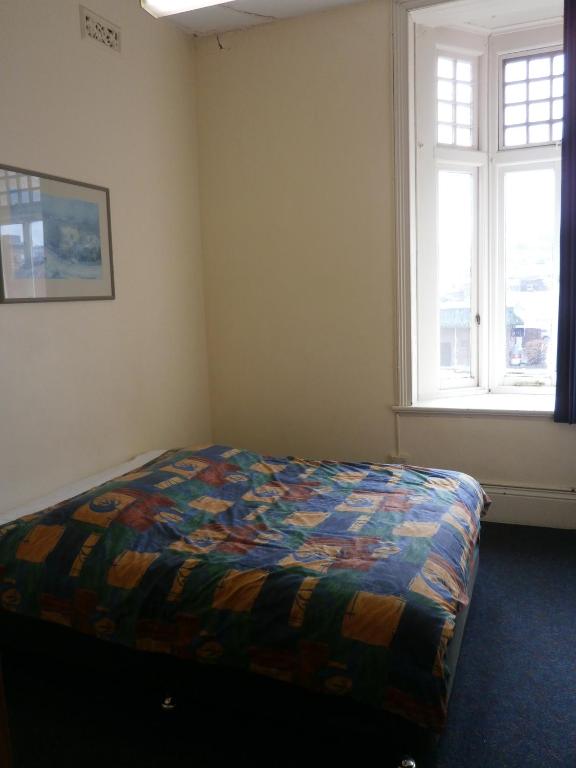 Postel nebo postele na pokoji v ubytování Launceston Backpackers