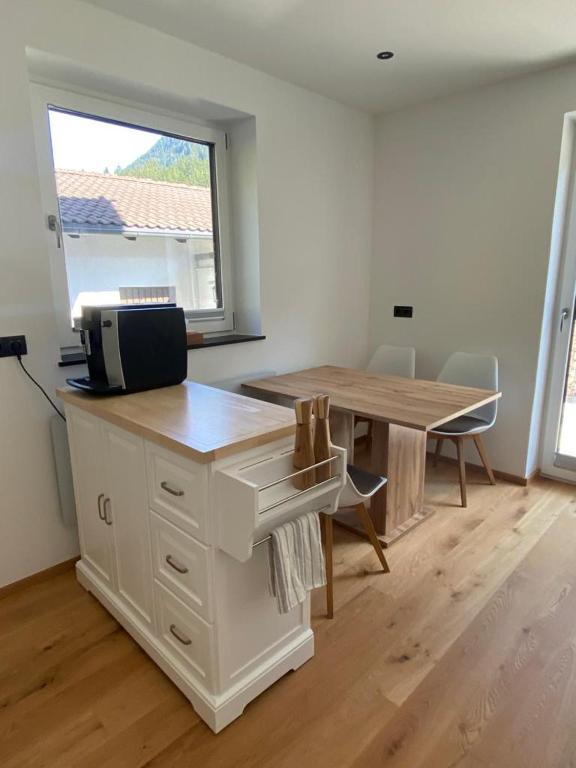 Kuchyň nebo kuchyňský kout v ubytování Alpine Apartment Belluca