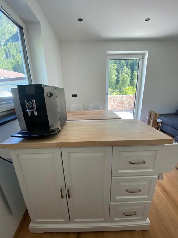Kuchyň nebo kuchyňský kout v ubytování Alpine Apartment Belluca