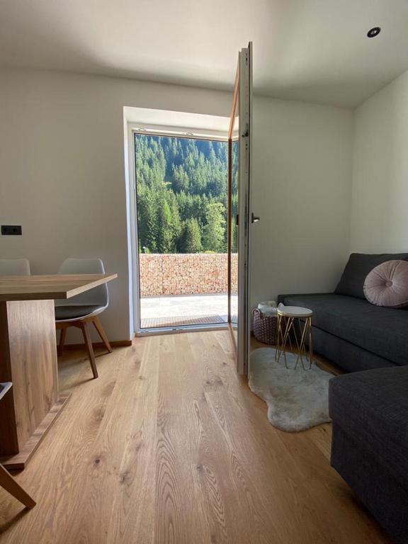 Posezení v ubytování Alpine Apartment Belluca