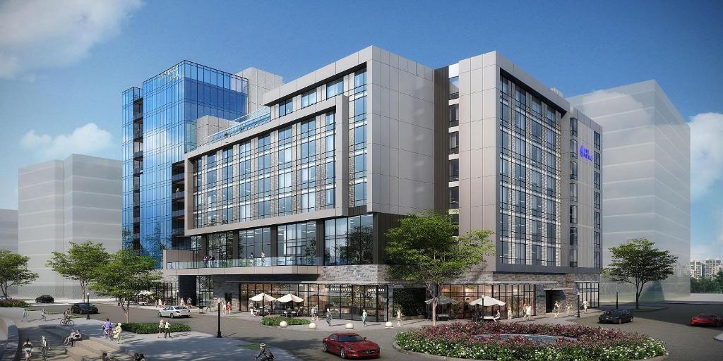 a rendering of a large glass building at Hotel Indigo - Vancouver Dwtn - Portland Area, an IHG Hotel in Vancouver