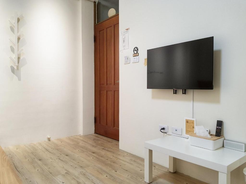 TV a/nebo společenská místnost v ubytování 艾睏khùn行旅