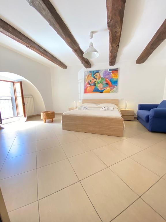 Postel nebo postele na pokoji v ubytování Ch Suite & PrivateParking - Corso 18 Agosto - Apartment