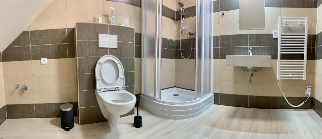 Koupelna v ubytování Apartmány Statek Bezdědice