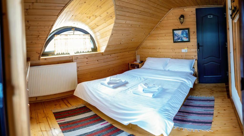 Postel nebo postele na pokoji v ubytování Casa Buga