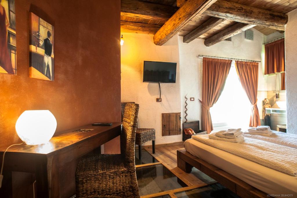 Postel nebo postele na pokoji v ubytování Maso Franceschella